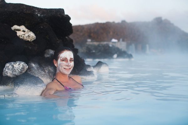 Woman,Relaxing,In,Geothermal,Spa,In,Hot,Spring,Pool,In